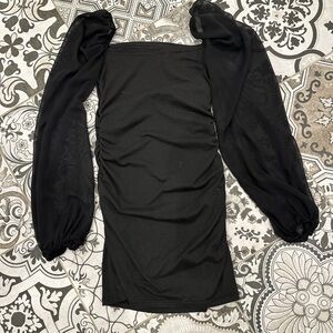 Elegant Black Dress with Sheer Sleeves